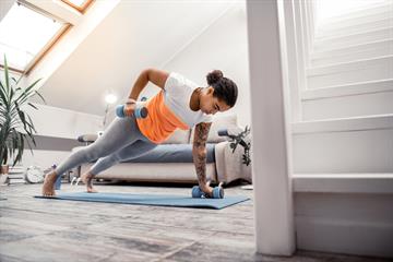 A girl doing workout at home